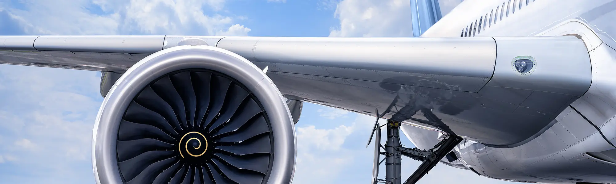 A JE cargo bay access stand positioned to a specific aircraft opening