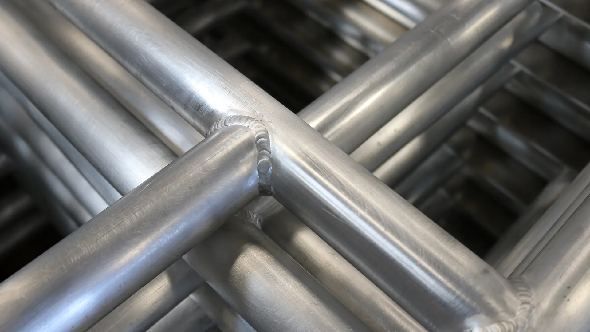 A JE welder working on a fabricated aluminum assembly