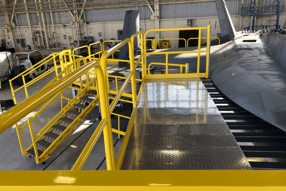 An access platform contoured to an aircraft wing and tail