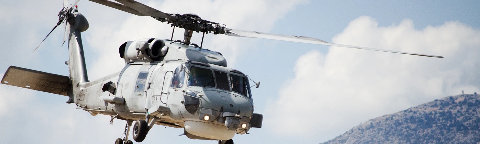 An H-60 helicopter with maintenance access alongside